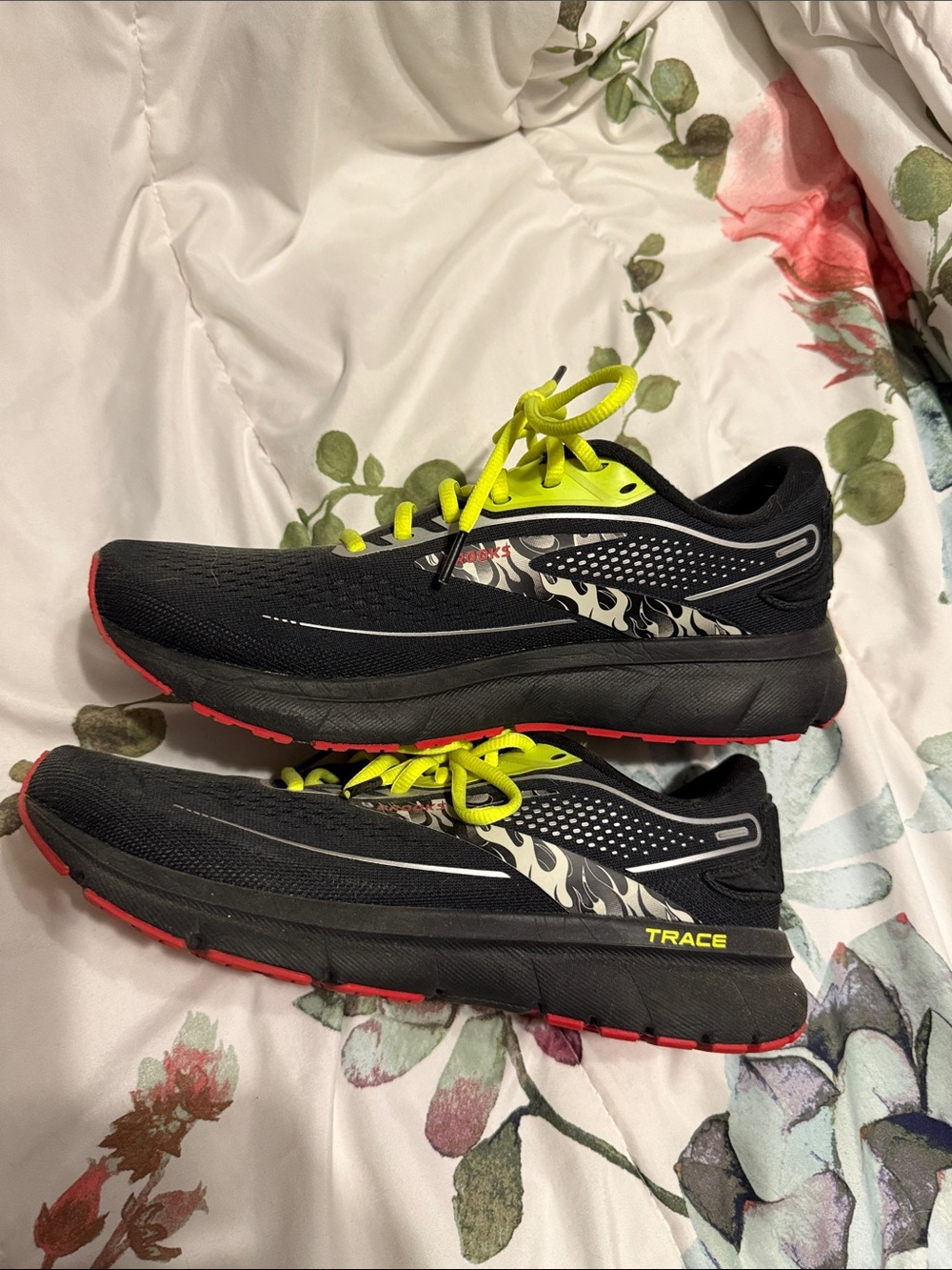 Brooks Trace Men's Black Running Shoes with Neon Yellow Laces and Red Outsole